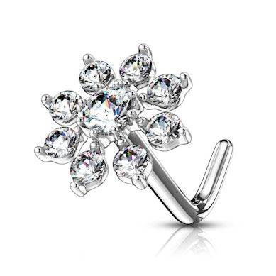 Neuspiercing met acht armig sterretje met steentjes