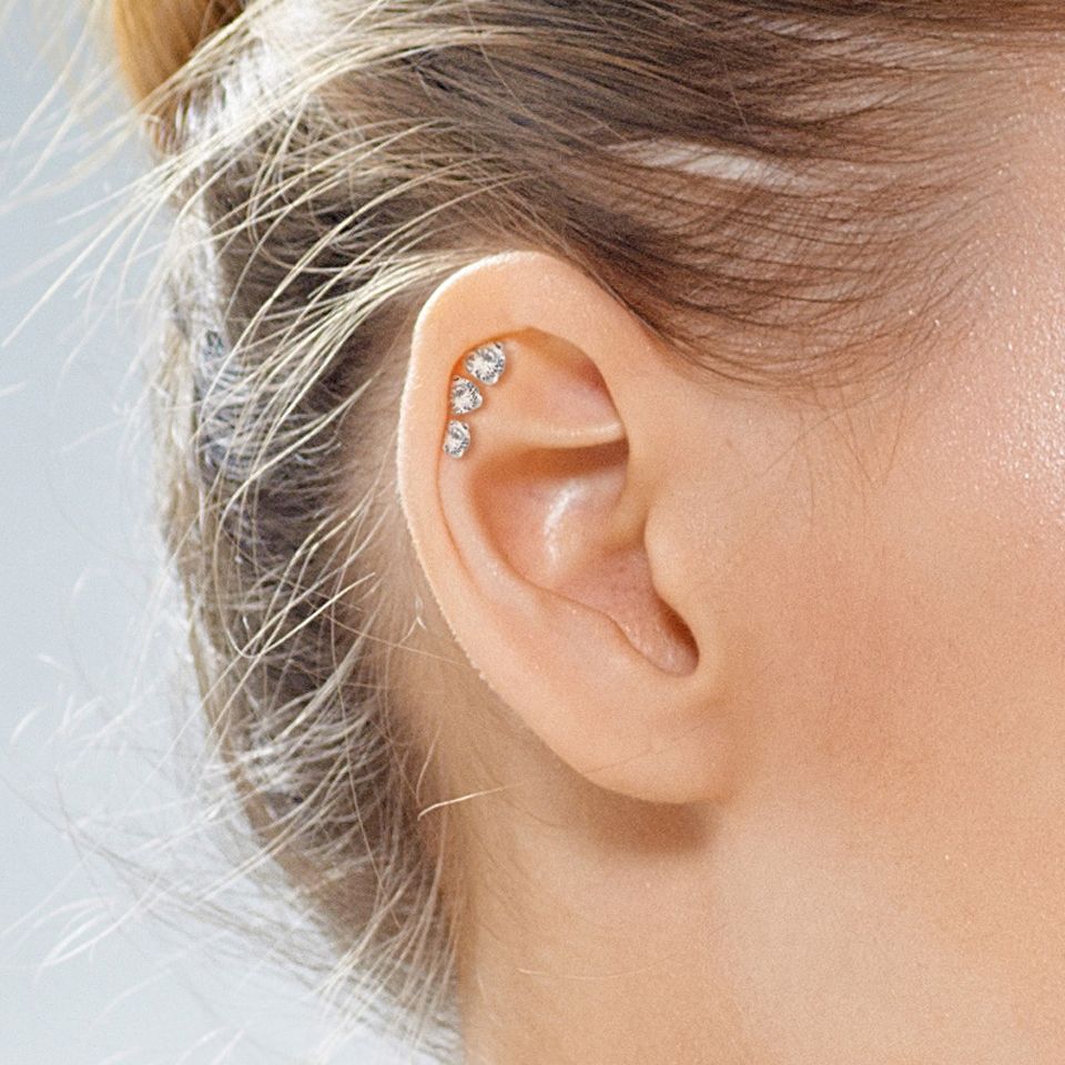 Set oorpiercings met een rond steentje