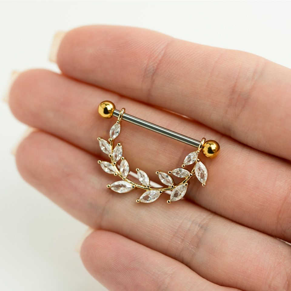 Tepelpiercing met blaadjes van steentjes