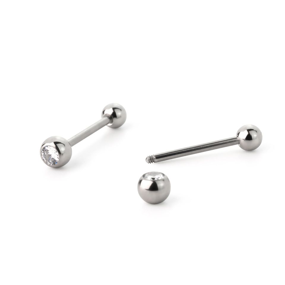 Tongpiercing met steentjes in verschillende kleuren