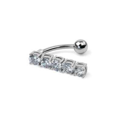 Navelpiercing met vijf grote stenen