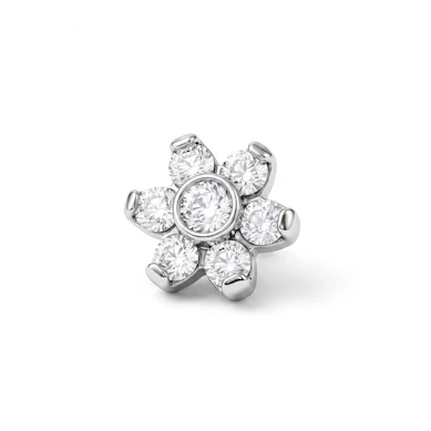 Dermal anchor met een bloem gevormd uit steentjes