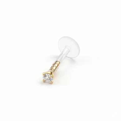 Labret van 14 karaats goud met een ronde steen en ptfe staaf
