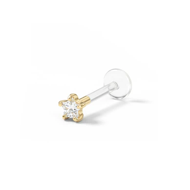 Labret uit 14 karaats goud met een stervormige steen en ptfe staaf