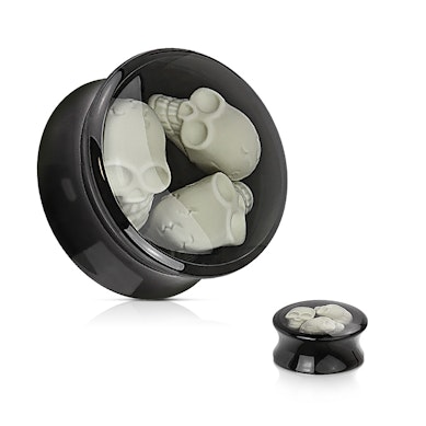 Plug van acryl met drie skulls