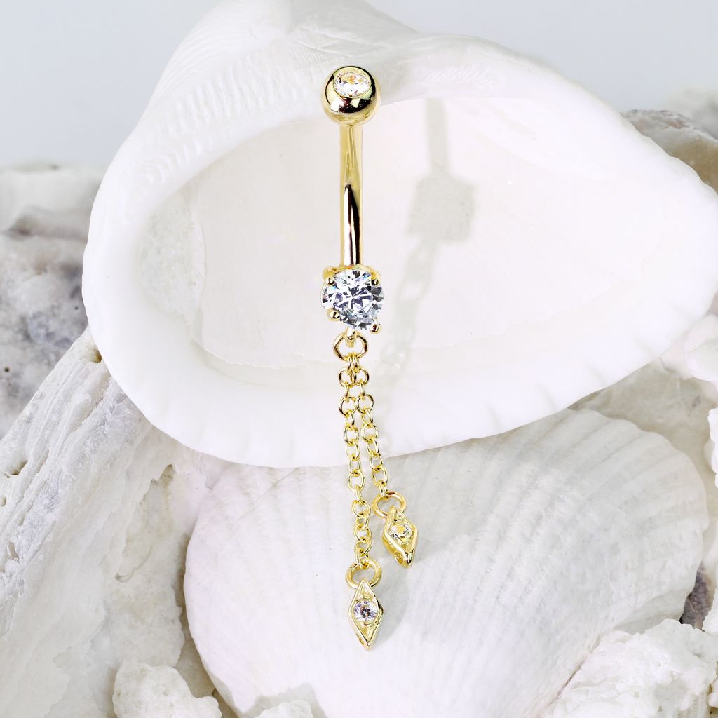 Mooie navelpiercing van 14k goud met steentjes