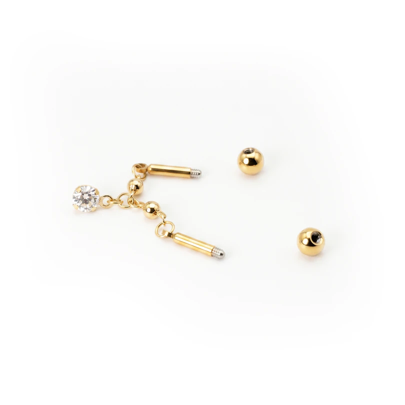 Industrial barbell met ketting en hangend steentje
