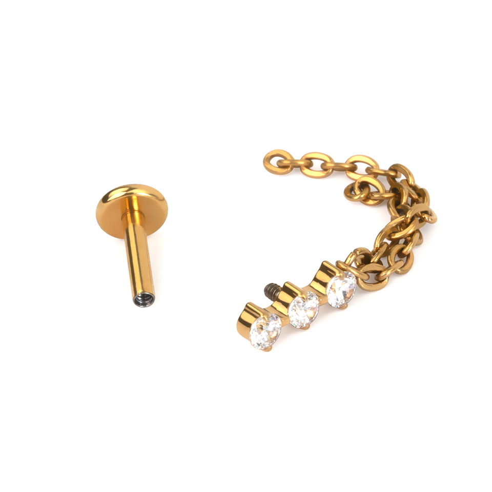 Titanium labret met trio van steentjes en dubbel kettinkje