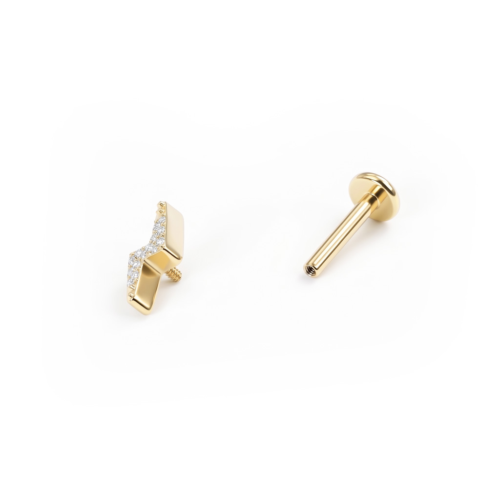 Bliksemschicht titanium labret met steentjes