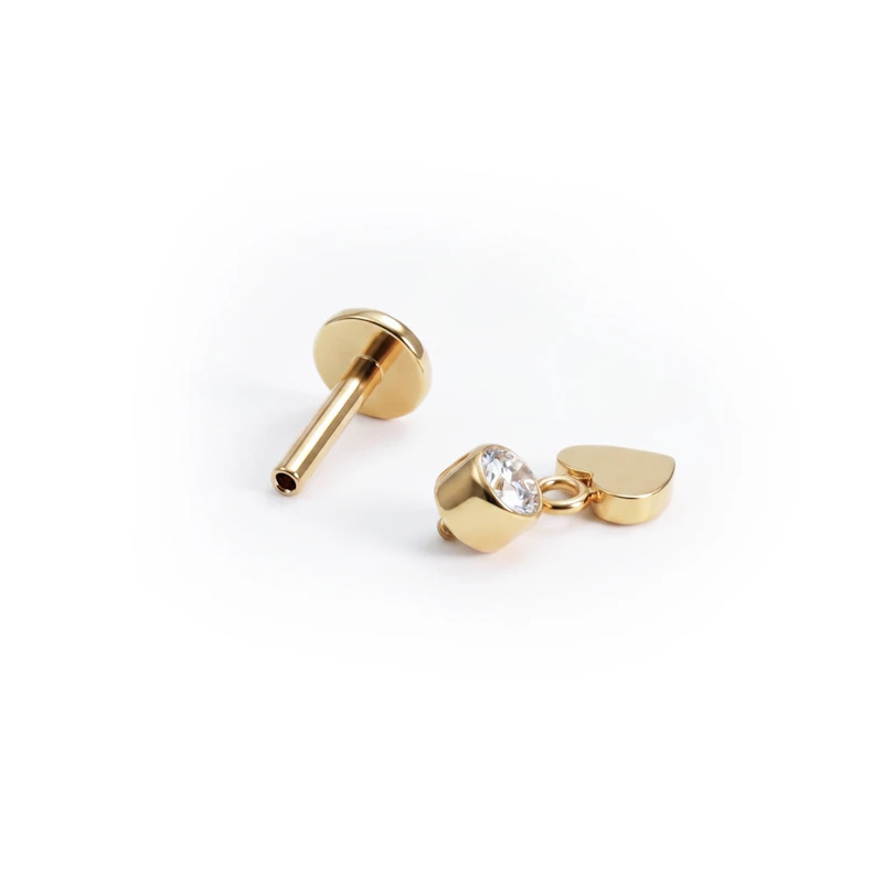 Titanium labret met hartbedeltje