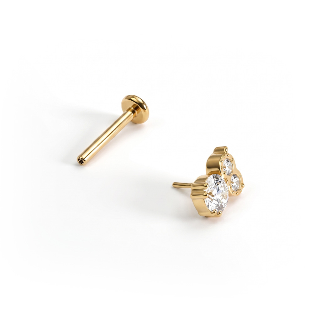 Titanium labret in uilvorm met steentjes