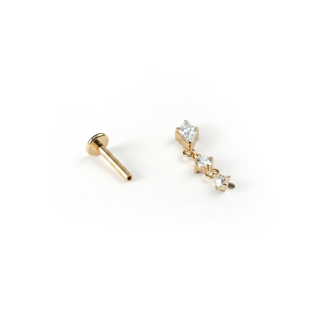 Titanium labret met trapsgewijs geplaatste steentjes