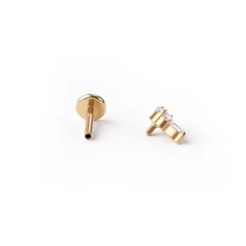 Titanium labret met centrale ster en marquise-steentjes