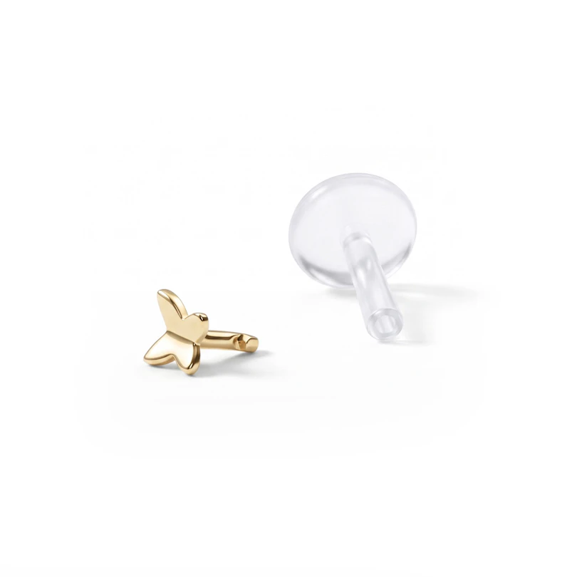Vlinder labret uit 14 karaats goud met ptfe staaf