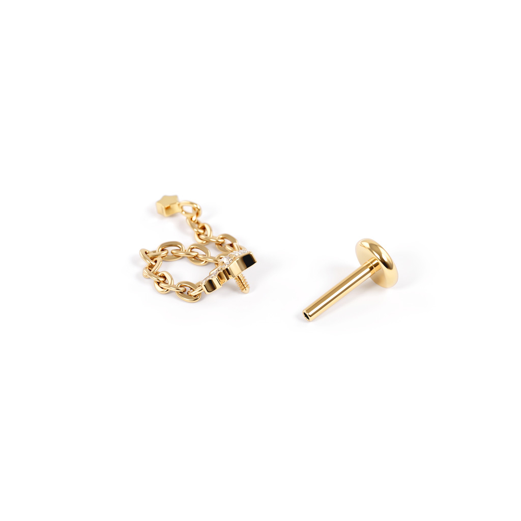 Titanium labret met sterren en sterbedel