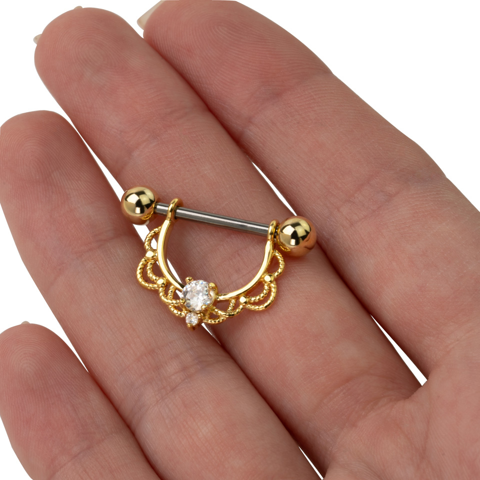 Tepelpiercing met filigraanpatroon en steen