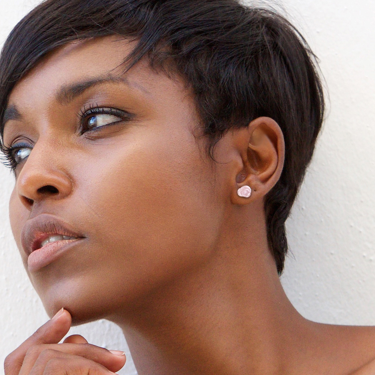 Plug uit rozenkwarts in de vorm van een roos