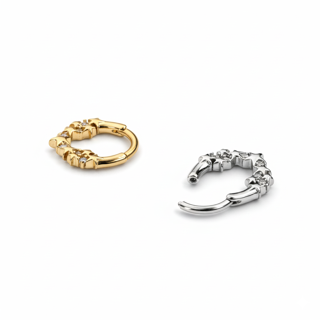 Naar voren gerichte ring met sterren en steentjes